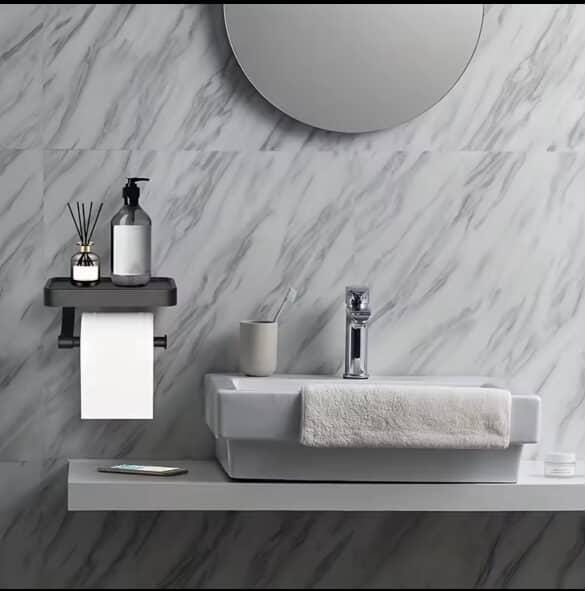 Toilet paper holder with shelf
