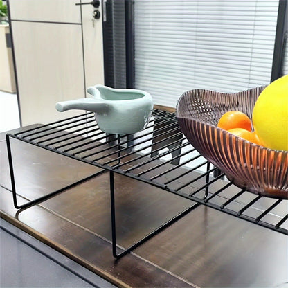 Expandable shelf raiser