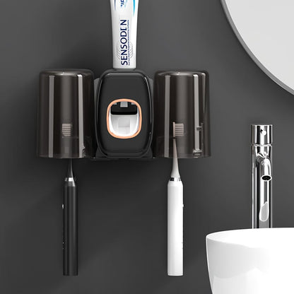 Toothpaste dispenser and toothbrush holder