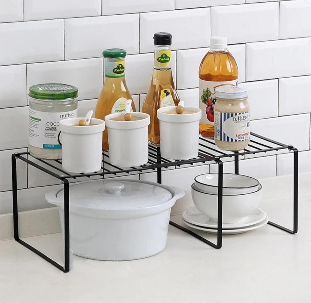 Expandable shelf raiser