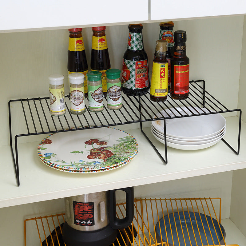 Expandable shelf raiser