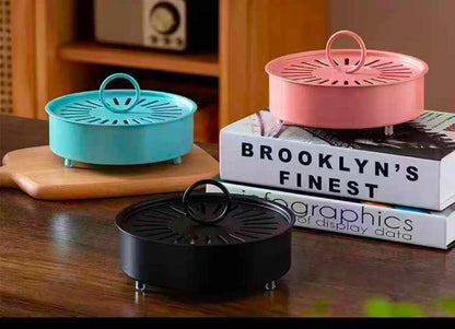 Iron mosquito-repellent incense box with cover.