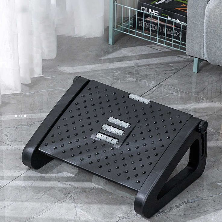 Adjustable foot rest/under desk footrest massage