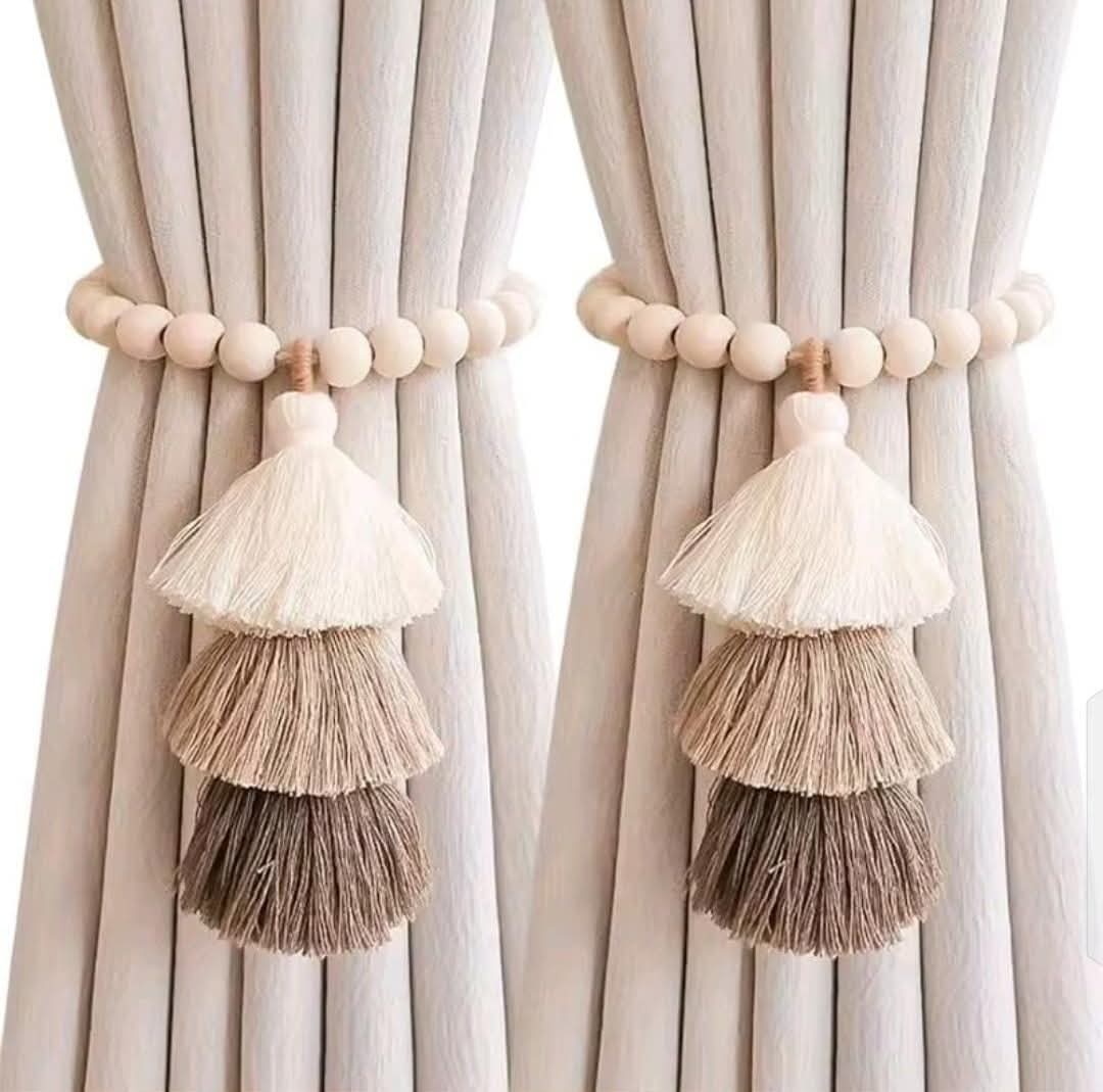 Magnetic &nbsp;curtain tie backs with wooden beads and tassel.