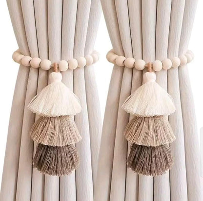 Magnetic &nbsp;curtain tie backs with wooden beads and tassel.