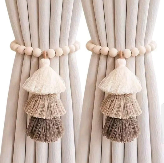 Magnetic &nbsp;curtain tie backs with wooden beads and tassel.