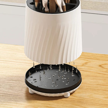 Modern rotating high quality cutlery organizer.