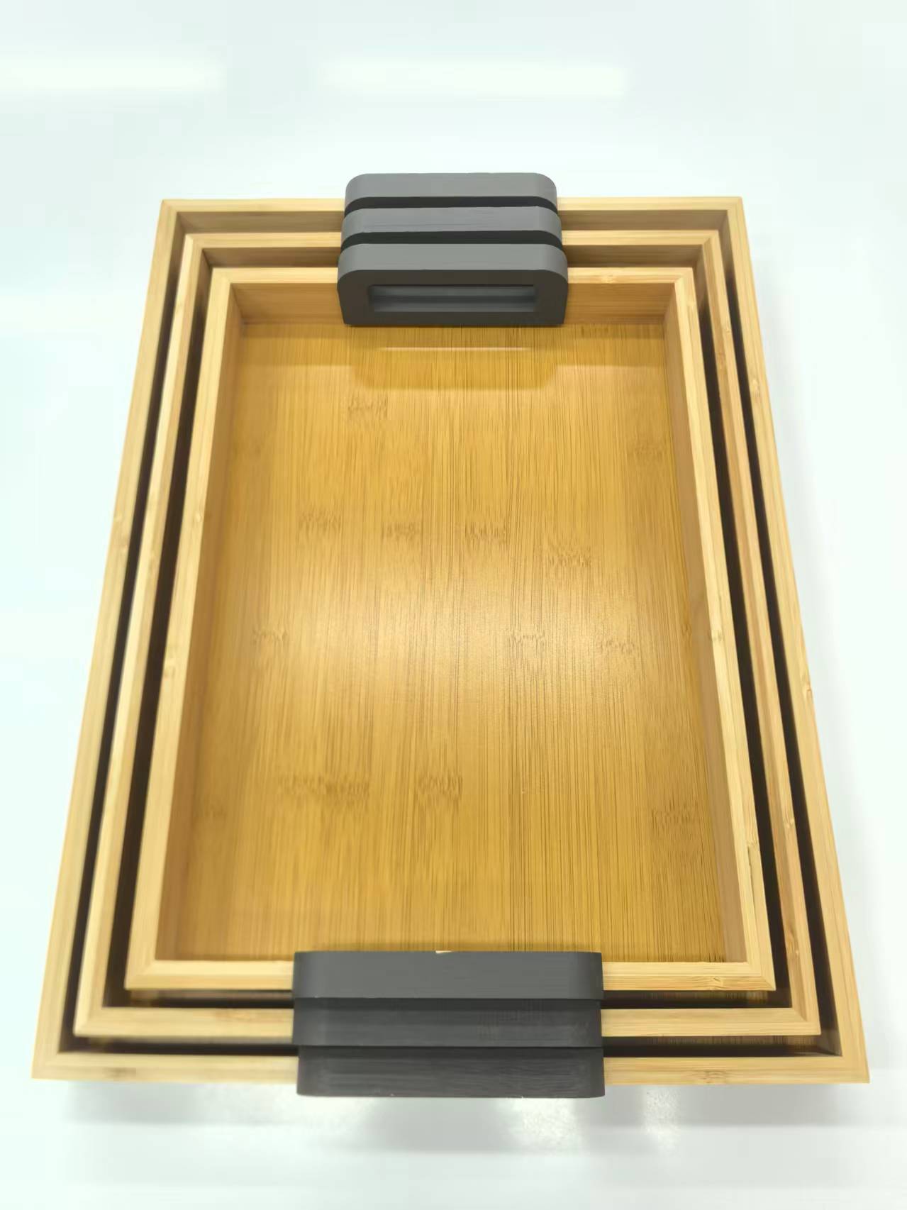 3-Piece Bamboo Nesting trays with Grey Handles.