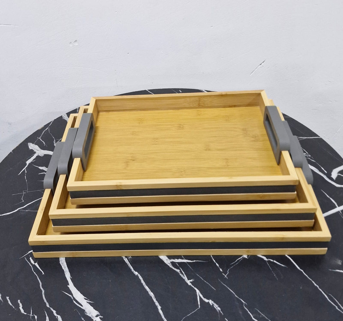 3-Piece Bamboo Nesting trays with Grey Handles.